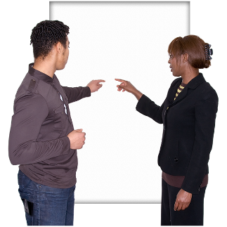 Two people pointing at a board
